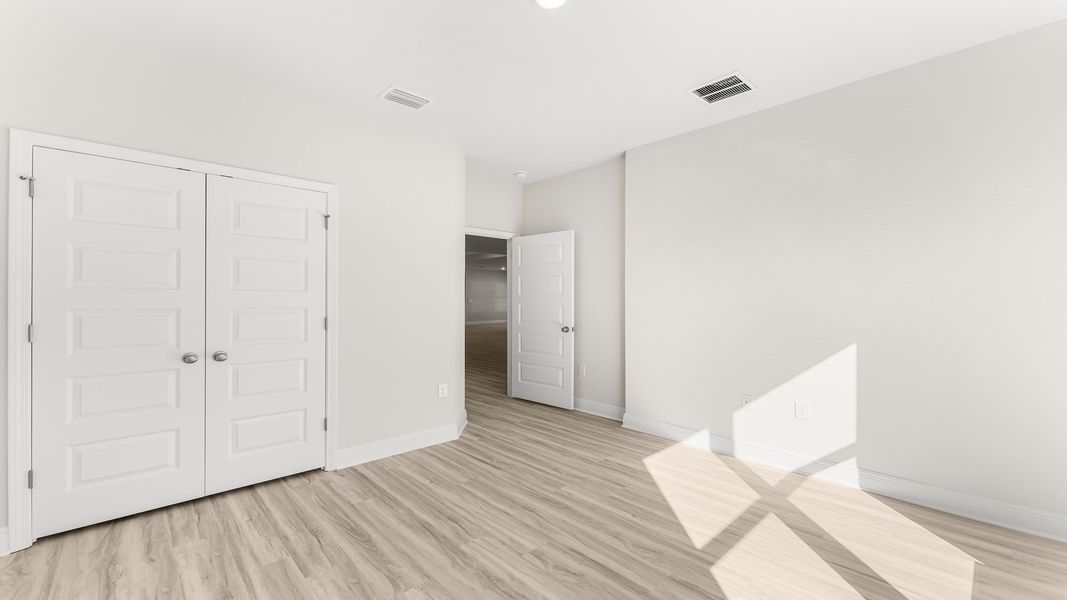 Image 16 representing the The Destin by D.R. Horton in Pine Creek and Heron Walk, Port St. Joe, FL.