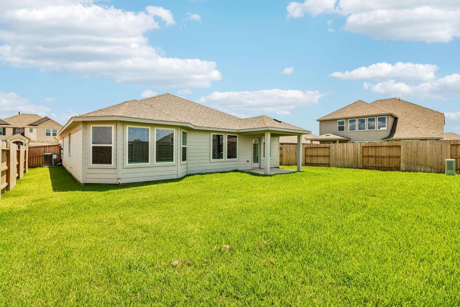 Exterior details and patio area of a home in Sanford Farms - Classic Series, Waller (Image 23).