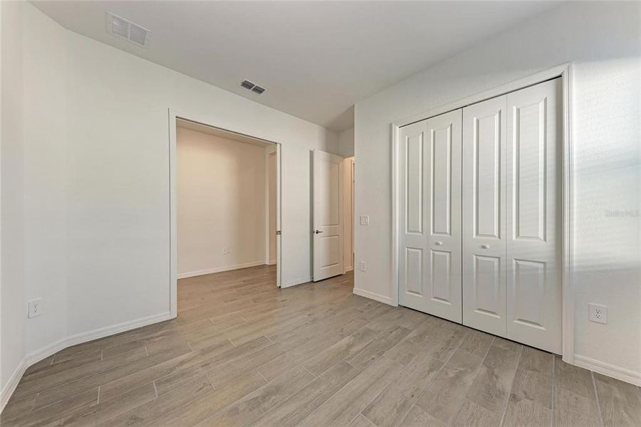 Spacious, unfurnished interior of a new home in Wellen Park Golf & Country Club: Executive Homes, Venice (Image 18).