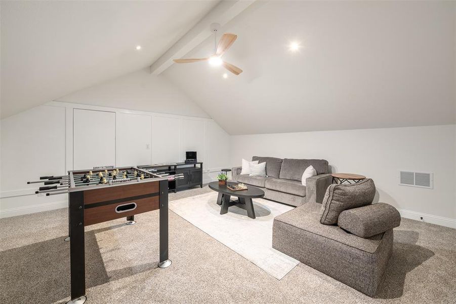 Rec room featuring light carpet Rec room featuring light carpet