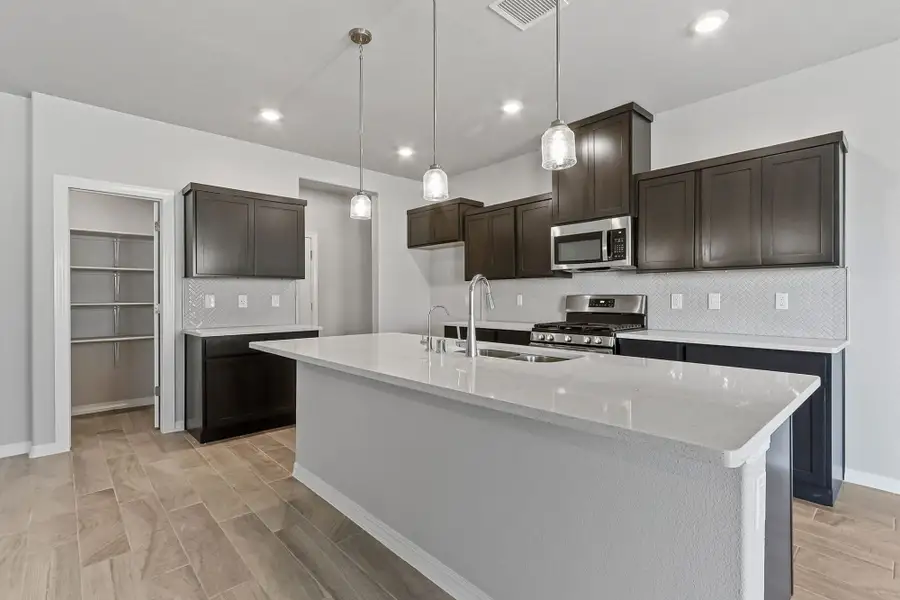 Furnished interior view inside a new home in Emerald Estates, Horizon City (Image 14). Furnished interior view inside a new home in Emerald Estates, Horizon City (Image 14).