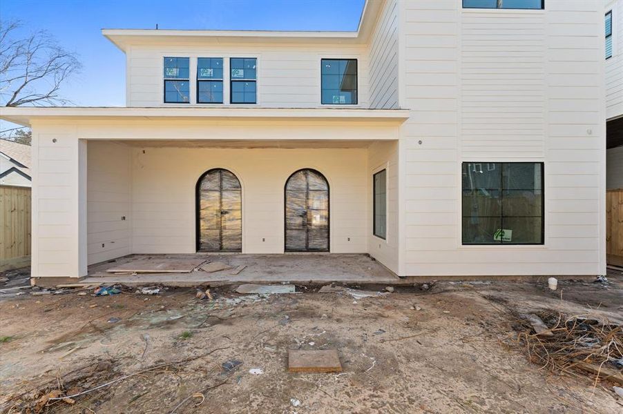 The inviting 9 ft x 25 ft covered patio is pre-wired for an outdoor kitchen.