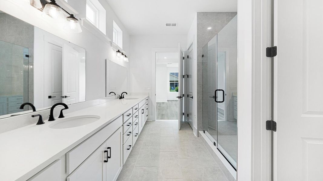 Furnished interior view inside a new home in Summerwind Crossing at Lakes of Cane Bay, Summerville (Image 3).