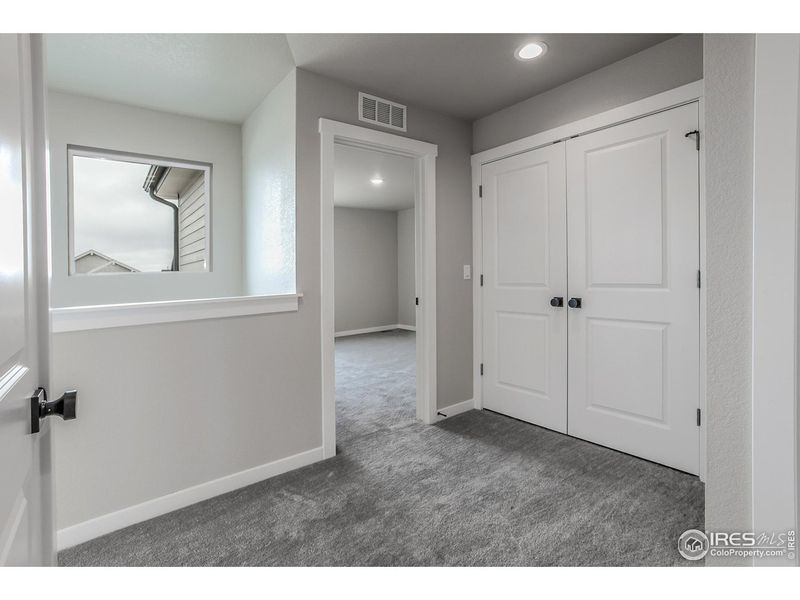 Spacious, unfurnished interior of a new home in Promontory Point, Greeley (Image 28).