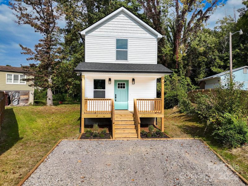 Front exterior of a new home in , Marion, NC, highlighting curb appeal (Image 19).