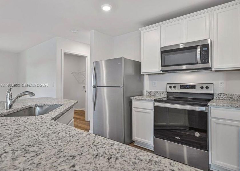 Furnished interior view inside a new home in , Fort Myers (Image 2). Furnished interior view inside a new home in , Fort Myers (Image 2).