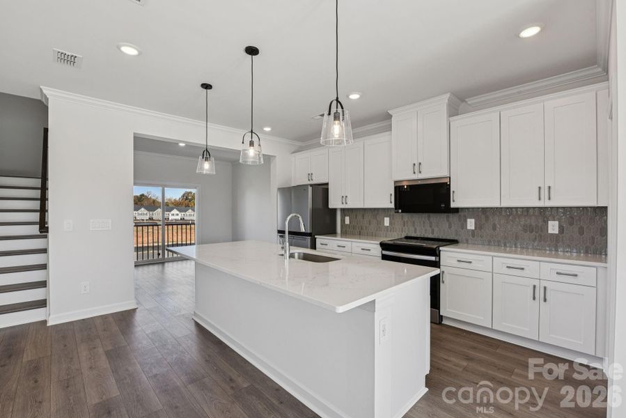Photo is not of the actual home, but is an inspirational photo of builder’s model home and may depict options, furnishings, and/or decorator features that are not included