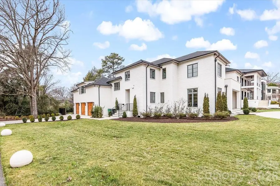 Front exterior of a new home in , Charlotte, NC, highlighting curb appeal (Image 2). Front exterior of a new home in , Charlotte, NC, highlighting curb appeal (Image 2).