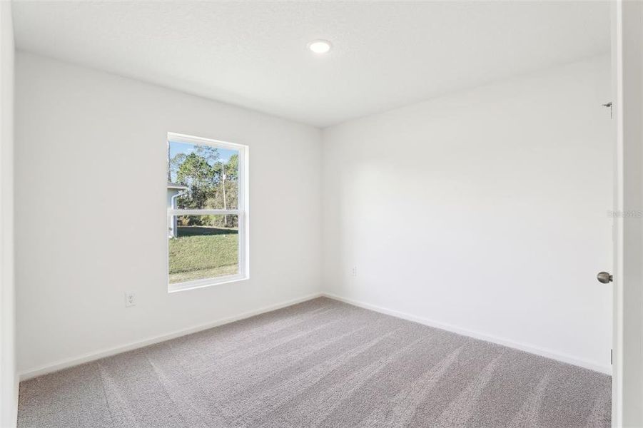 Spacious, unfurnished interior of a new home in Sun 'N Lake, Sebring (Image 22). Spacious, unfurnished interior of a new home in Sun 'N Lake, Sebring (Image 22).