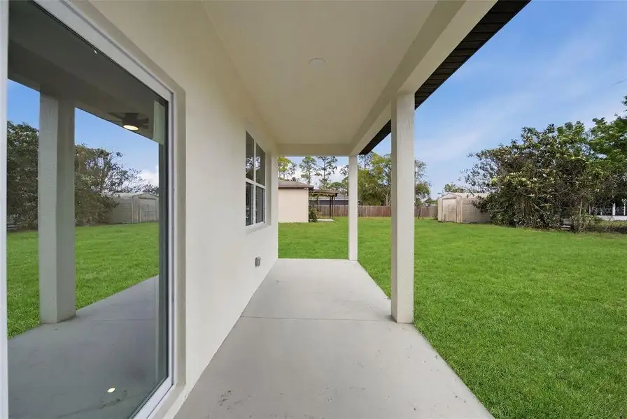 Exterior details and patio area of a home in , Palm Bay (Image 3).