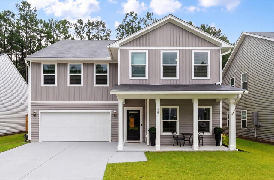 Front exterior of a new home in Watson Hill, Summerville, SC, highlighting curb appeal (Image 22).