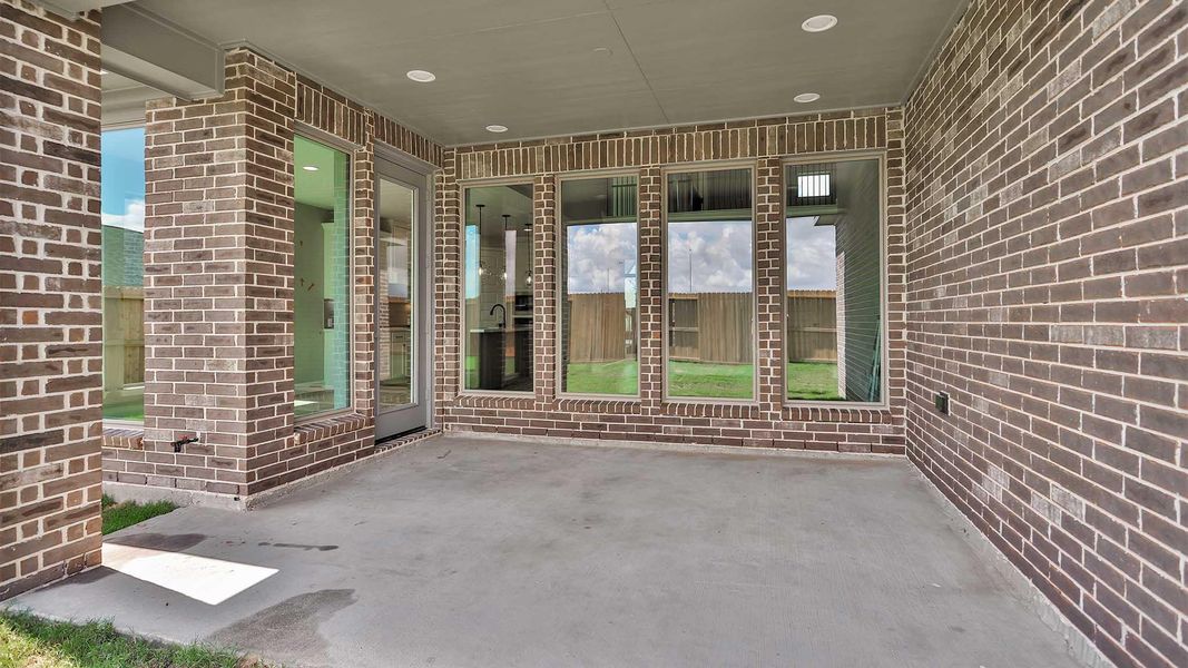 Exterior details and patio area of a home in Cross Creek West 55', Fulshear (Image 3). Exterior details and patio area of a home in Cross Creek West 55', Fulshear (Image 3).