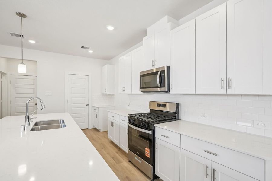 Furnished interior view inside a new home in Kemah Crossing - City Series, Kemah (Image 25).