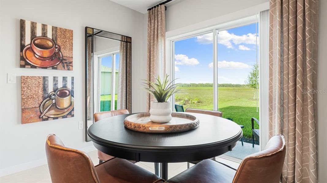 Furnished interior view inside a new home in Coasterra Community Group Page, Palmetto (Image 16).