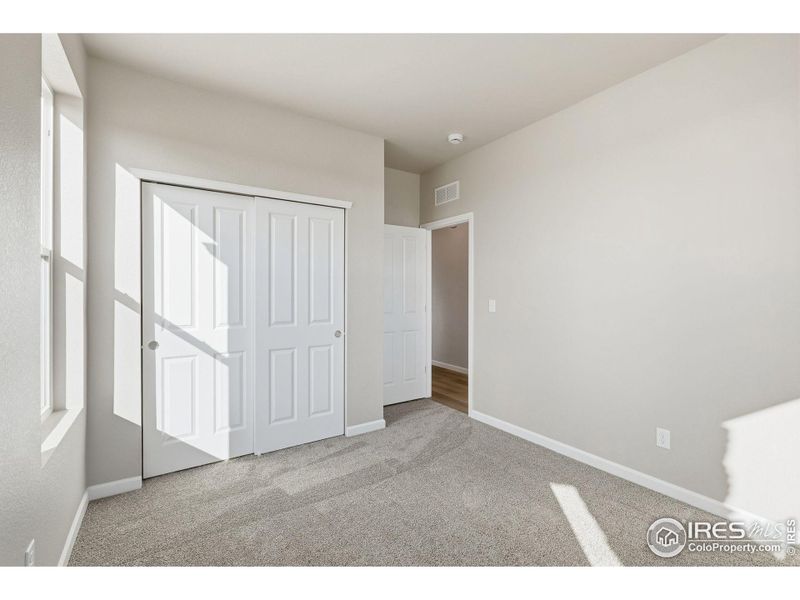 Spacious, unfurnished interior of a new home in Cordovan, Longmont (Image 12).