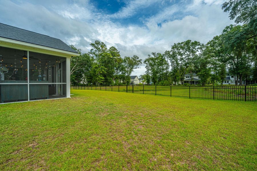 Front exterior of a new home in Saint John's Lake: Coastal Collection, Johns Island, SC, highlighting curb appeal (Image 23).
