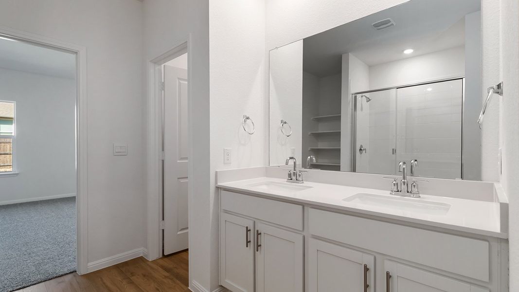 Representative furnished interior of a home built from the The Rosemont by D.R. Horton in Bar W Ranch, Leander (Image 8).