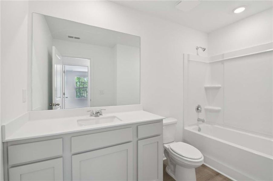 Furnished interior view inside a new home in The Pointe at Heron Bay, Locust Grove (Image 10).
