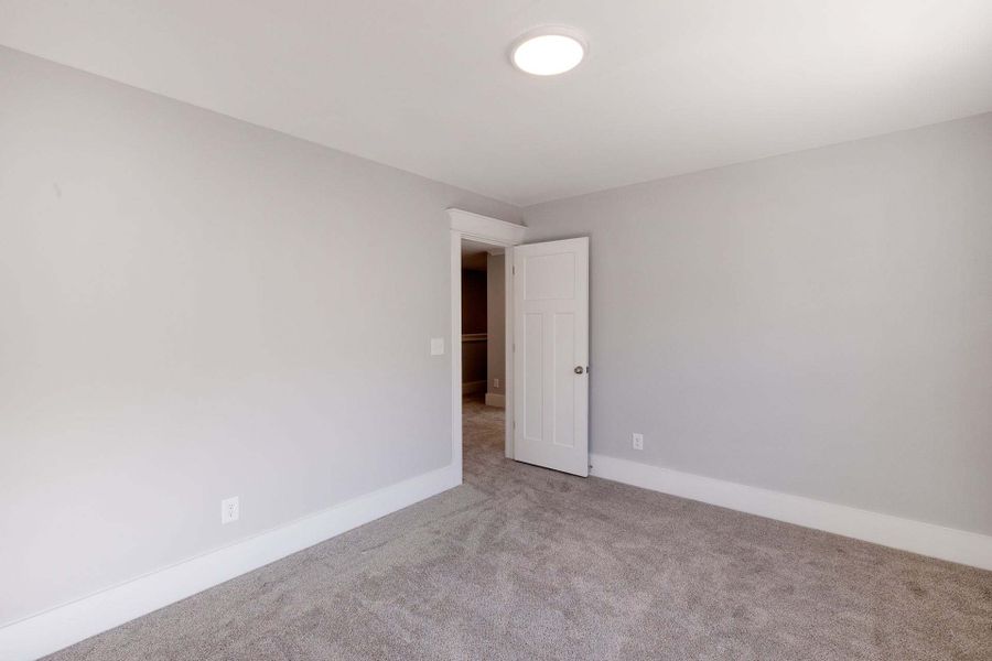 Representative unfurnished interior of a home built from the Austin by Caviness & Cates Communities in Bartlett Manor, Youngsville (Image 140).