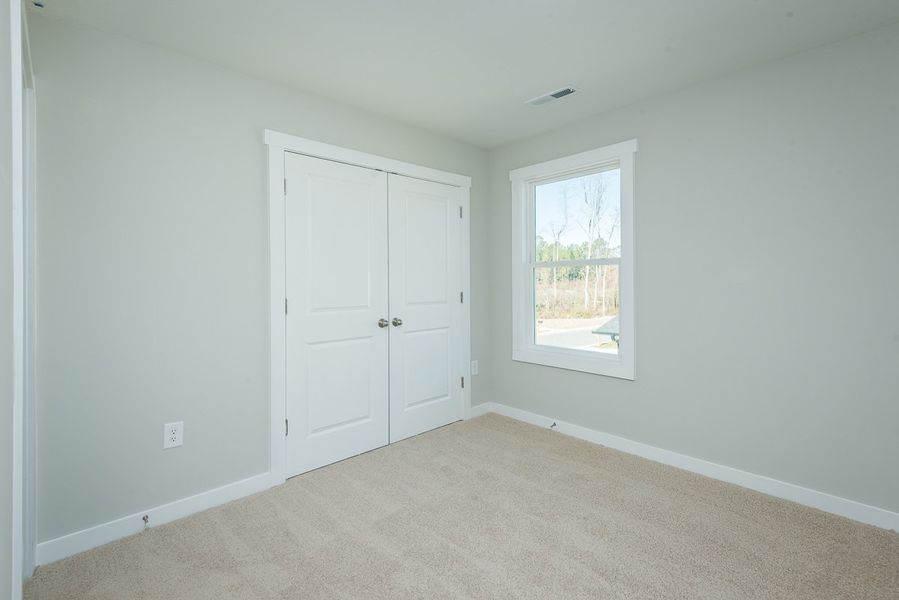Representative unfurnished interior of a home built from the Thomas by Foundation Home Builders LLC in Pinnix Loop, Burlington (Image 25).