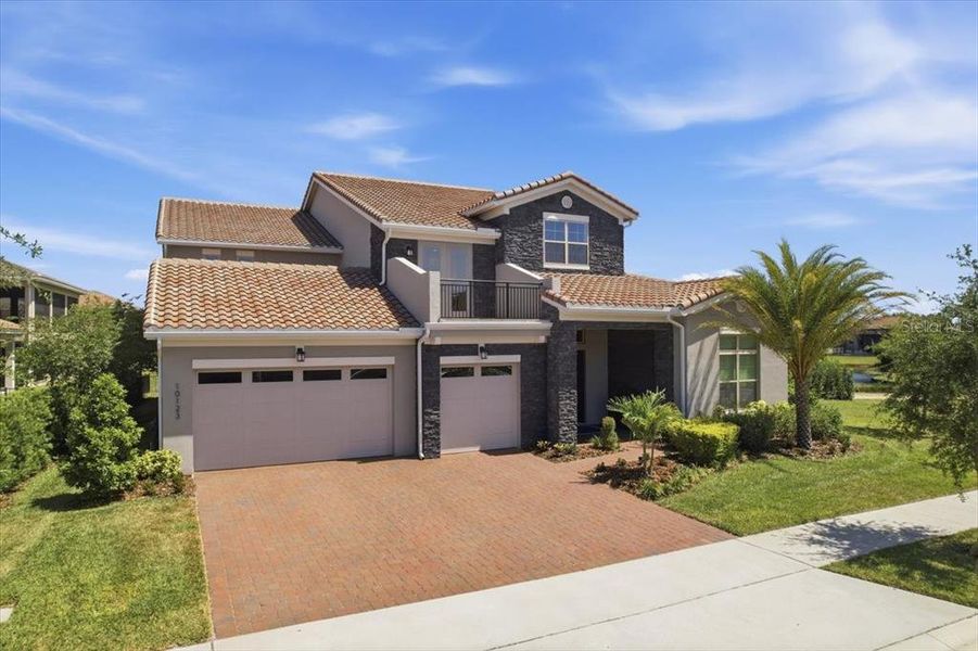 Front exterior of a new home in , Orlando, FL, highlighting curb appeal (Image 22).