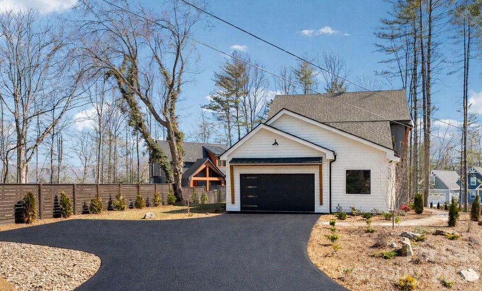 Front exterior of a new home in , Brevard, NC, highlighting curb appeal (Image 27).