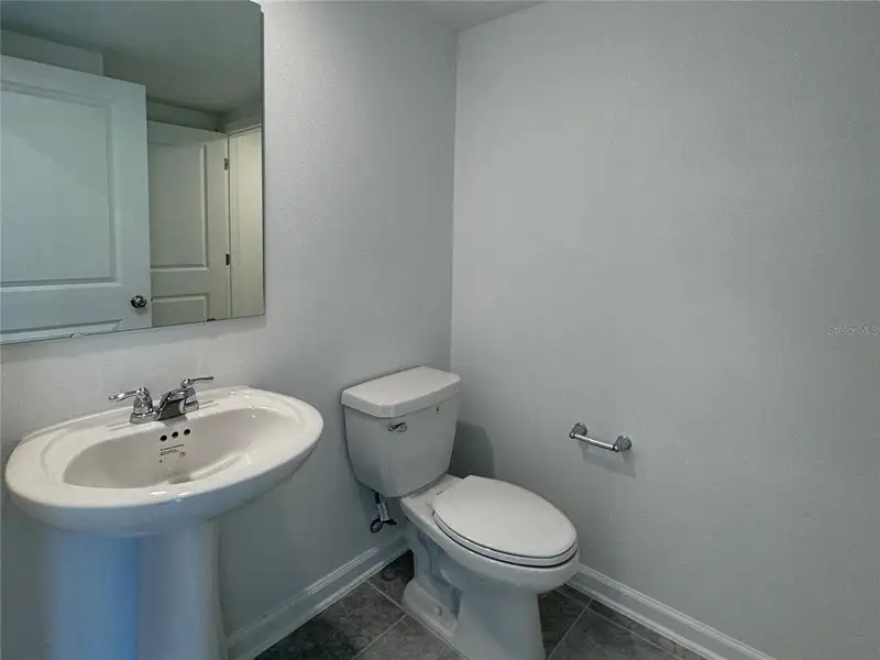 Furnished interior view inside a new home in , Kissimmee (Image 8).