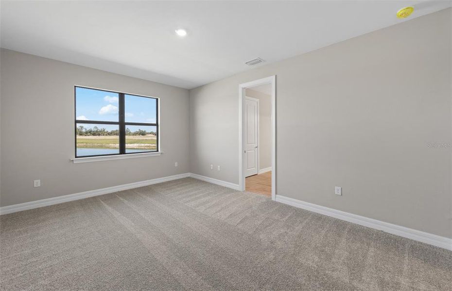 Spacious, unfurnished interior of a new home in The Strand at Cedar Grove, North Port (Image 33).