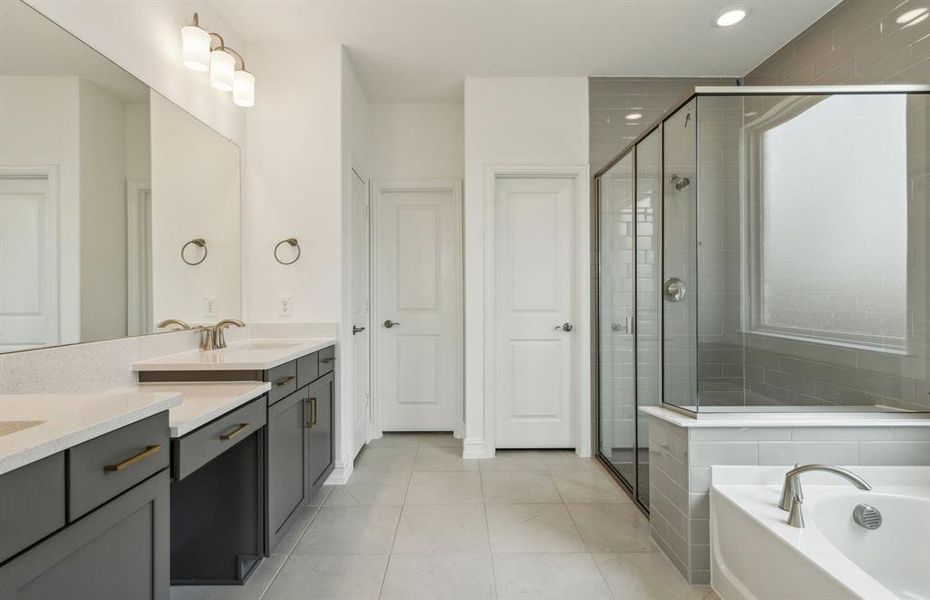 Elegant owner's bath with oversized shower *real home pictured