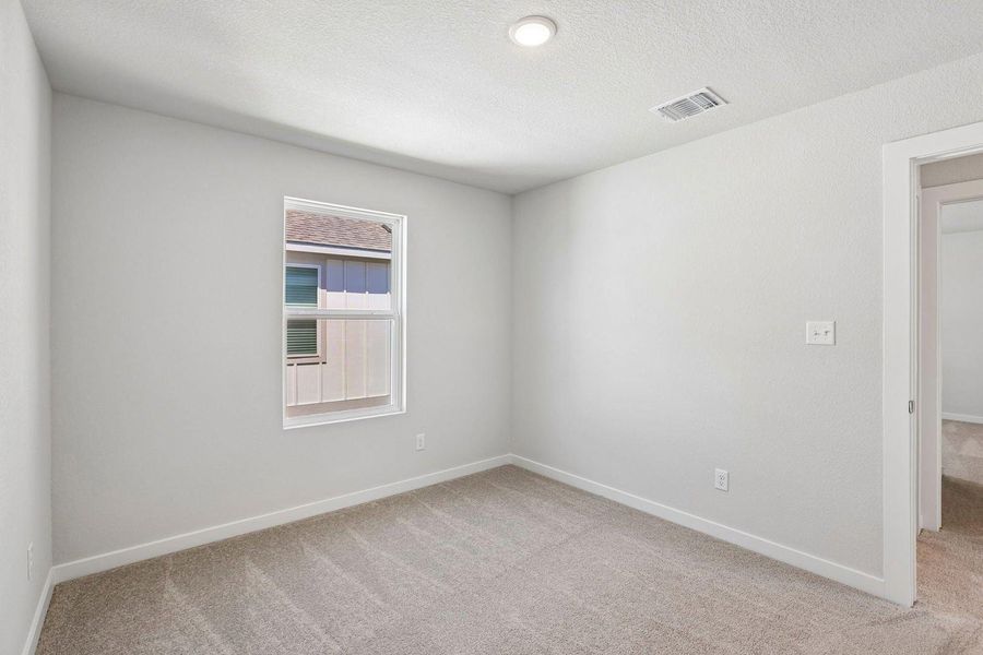 Spacious, unfurnished interior of a new home in Avery Centre, Round Rock (Image 16).