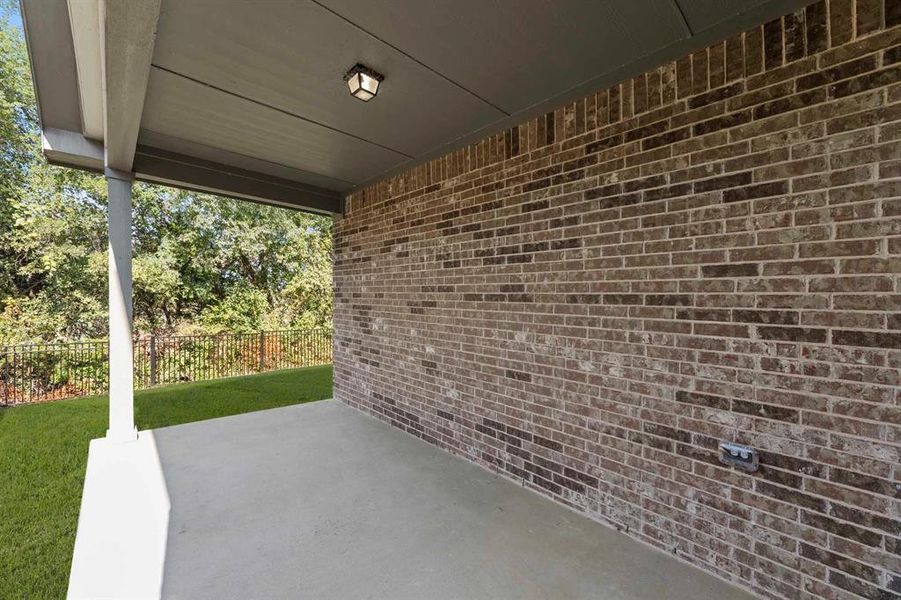 Exterior details and patio area of a home in Devonshire 40s, Forney (Image 4). Exterior details and patio area of a home in Devonshire 40s, Forney (Image 4).