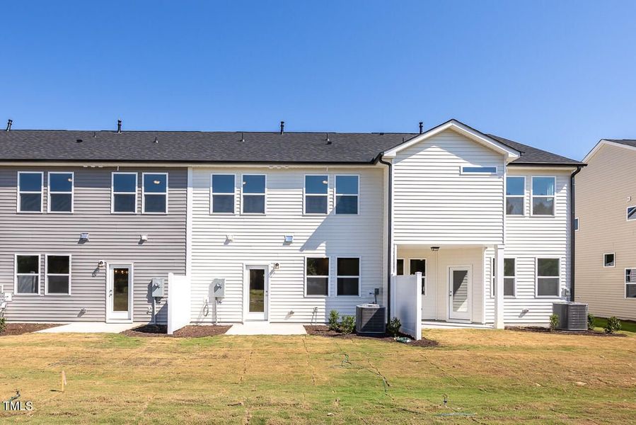 Front exterior of a new home in Springvale, Fuquay Varina, NC, highlighting curb appeal (Image 2).