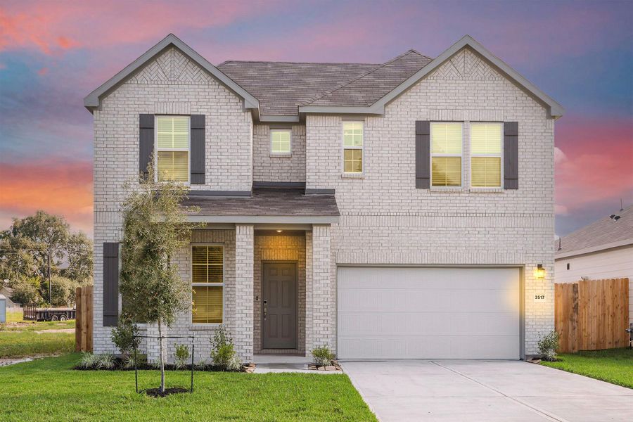 Front exterior of a new home in Russell Ranch, Bay City, TX, highlighting curb appeal (Image 2). Front exterior of a new home in Russell Ranch, Bay City, TX, highlighting curb appeal (Image 2).