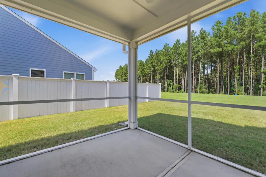 Exterior details and patio area of a home in , Ravenel (Image 25).