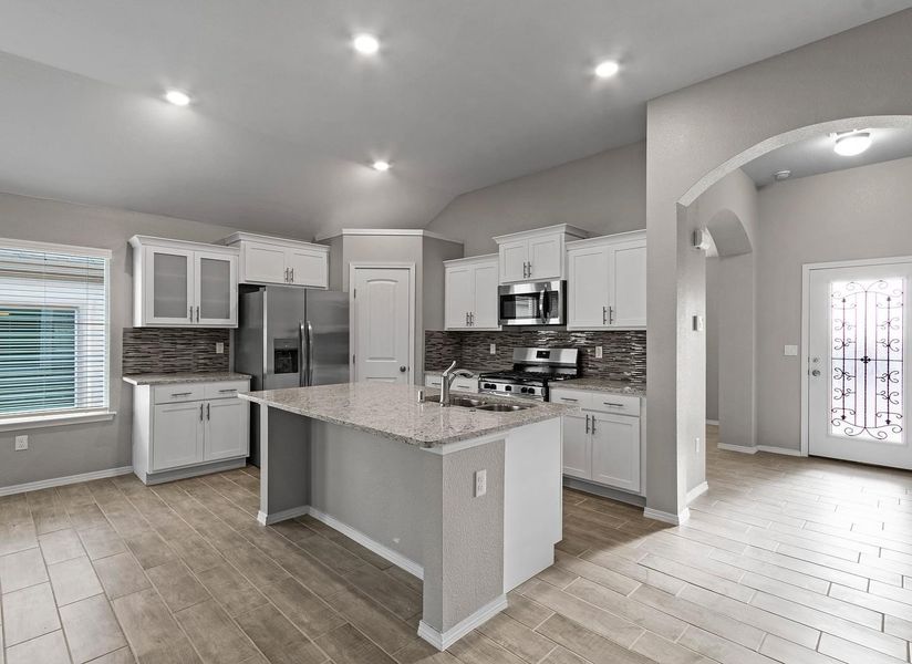 Representative furnished interior of a home built from the Mesilla 1747 SSC by Saratoga Homes in Crossland, El Paso (Image 5).