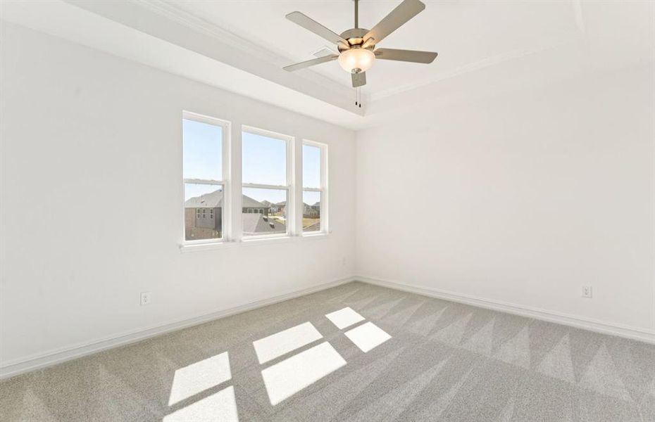 Spacious owner's suite highlighted by large windows and an exquisite tray ceiling Spacious owner's suite highlighted by large windows and an exquisite tray ceiling