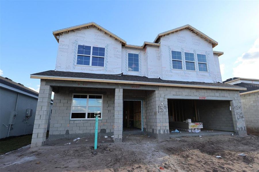 In-progress construction of a new home in Center Lake on the Park, St. Cloud, FL (Image 7).