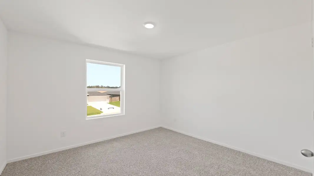 Representative unfurnished interior of a home built from the Franklin by D.R. Horton in Lake Conroe Cove, Willis (Image 28).