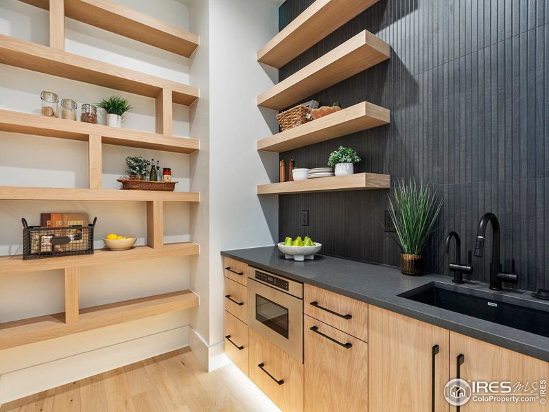 Butler's pantry with drawer microwave and prep sink