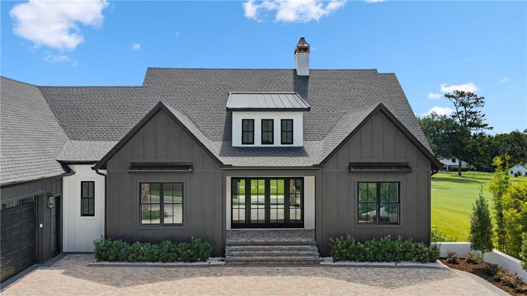 Front exterior of a new home in , Ocala, FL, highlighting curb appeal (Image 33).
