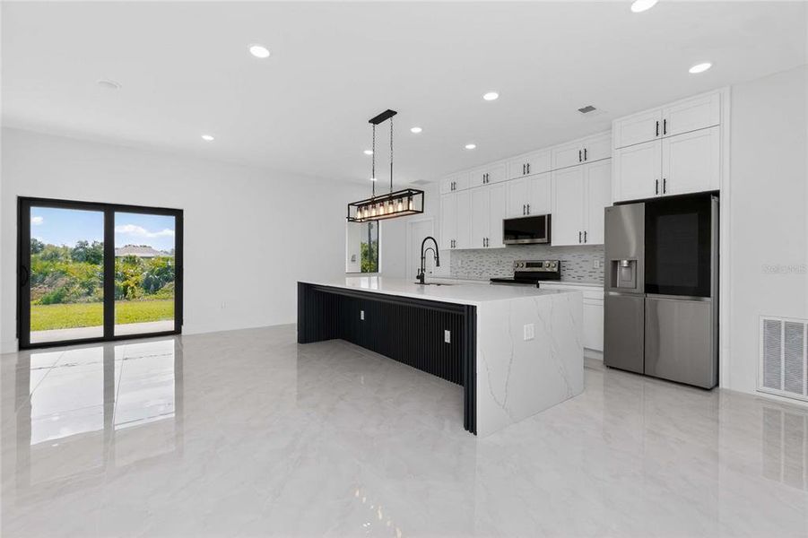 Furnished interior view inside a new home in , Port Charlotte (Image 9).
