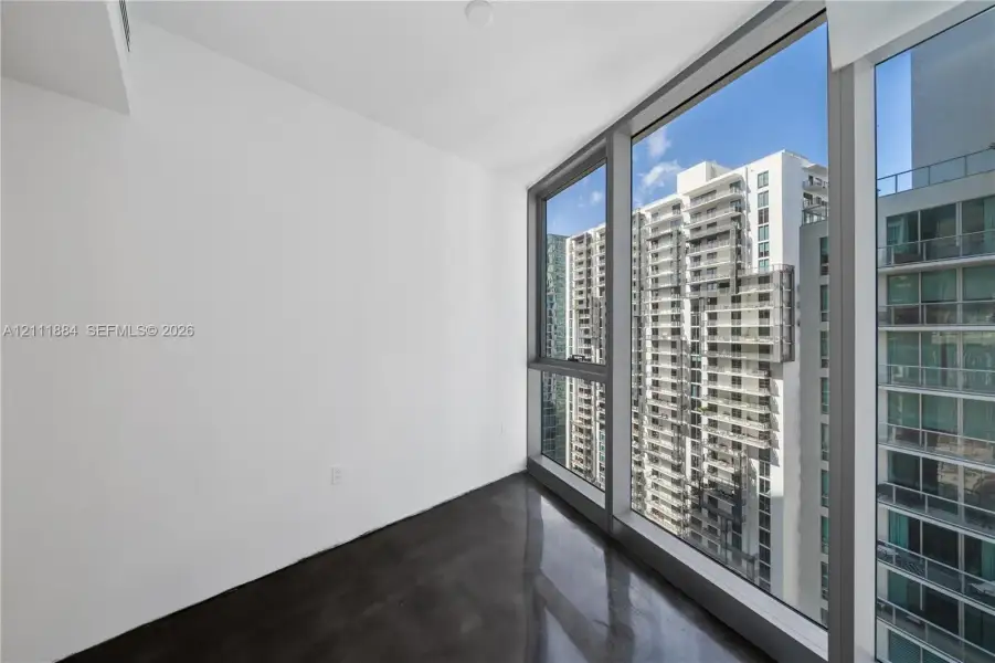 Floor-to-ceiling windows, polished concrete flooring, and metal-framed glazing Floor-to-ceiling windows, polished concrete flooring, and metal-framed glazing