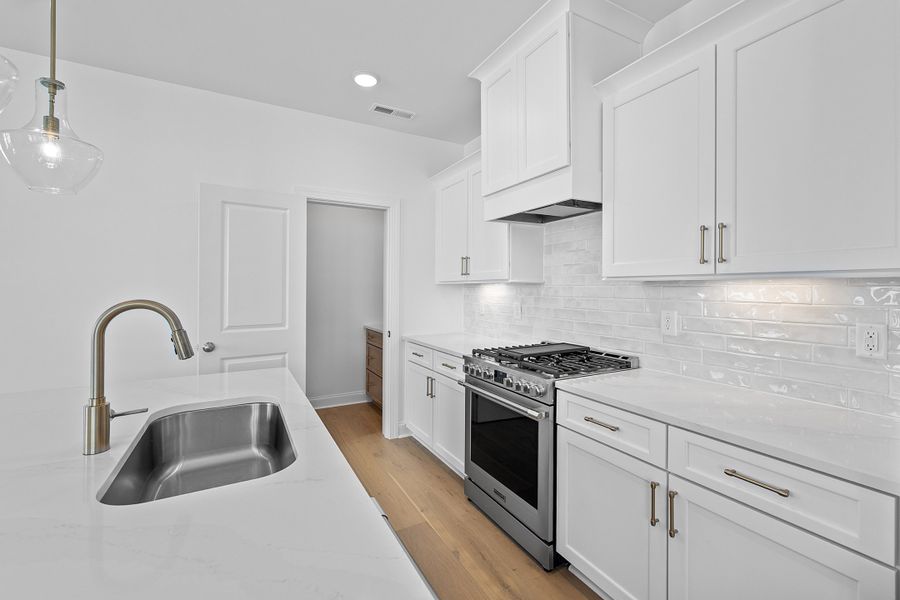 Representative furnished interior of a home built from the The Juniper by RobuckHomes in Kennebec Crossing, Angier (Image 11).