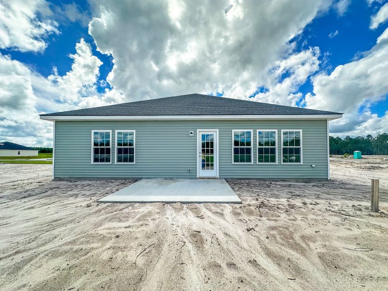 Exterior details and patio area of a home in Doctor's Creek, Ludowici (Image 2).
