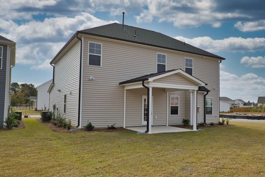 Representative exterior photo of a completed home built from the Aberdeen by Caviness & Cates Communities in Bartlett Manor, Youngsville, NC (Image 213).