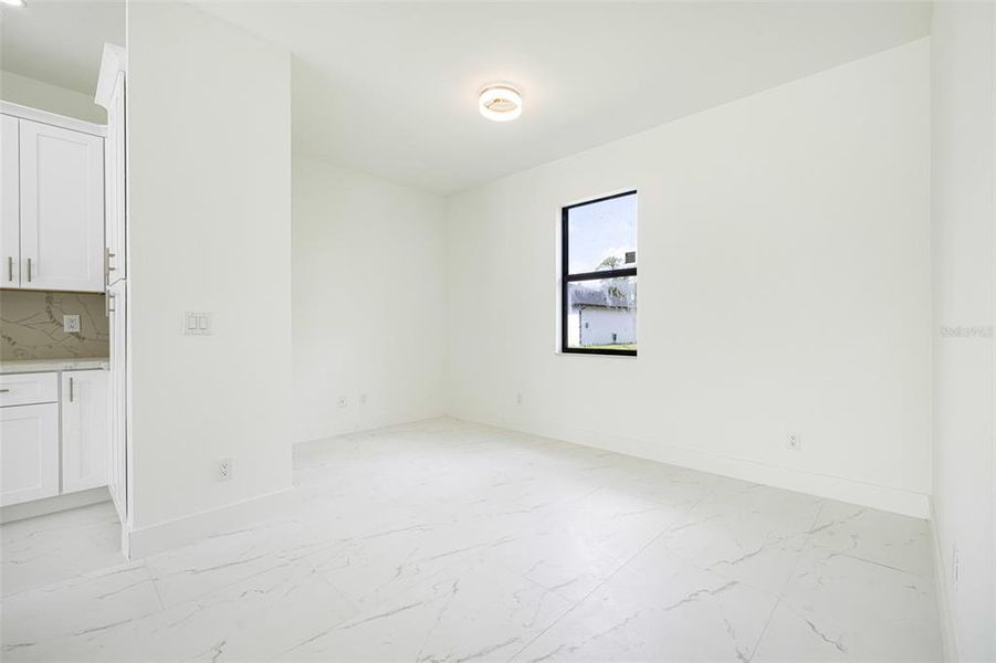 Spacious, unfurnished interior of a new home in , Port Charlotte (Image 26).