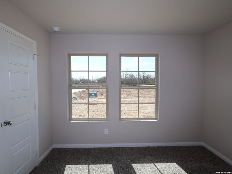 Spacious, unfurnished interior of a new home in Chaparral Ranch, Floresville (Image 28).