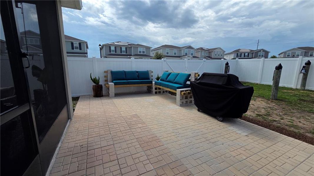 Exterior details and patio area of a home in Seasons at Heritage Square, Haines City (Image 22). Exterior details and patio area of a home in Seasons at Heritage Square, Haines City (Image 22).