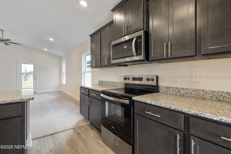 Furnished interior view inside a new home in Shadow Crest at Rolling Hills, Green Cove Springs (Image 6). Furnished interior view inside a new home in Shadow Crest at Rolling Hills, Green Cove Springs (Image 6).