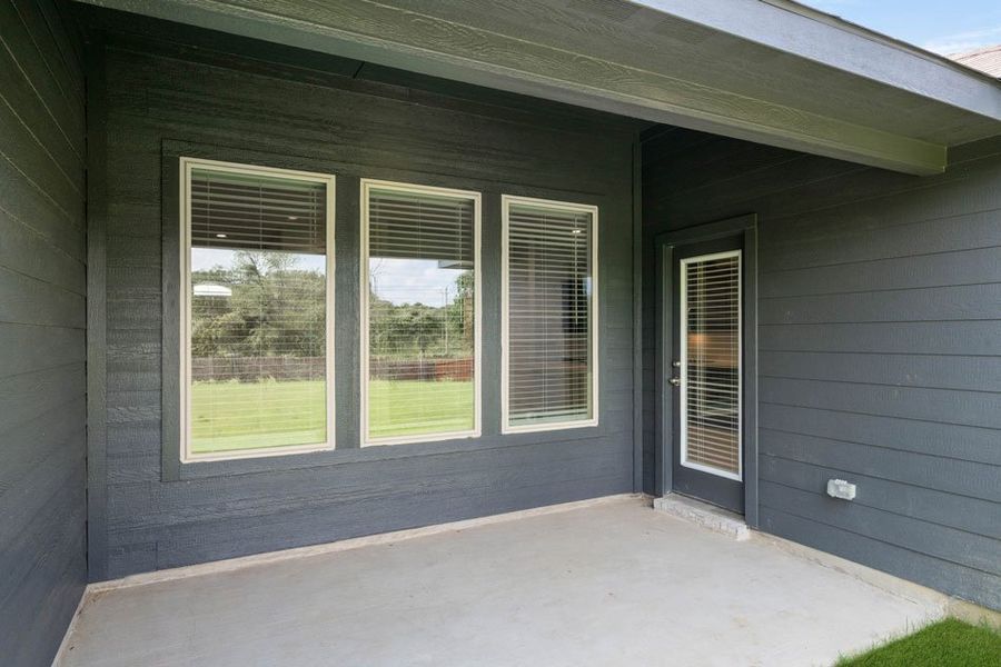 Front exterior of a new home in Mountain Valley, Burleson, TX, highlighting curb appeal (Image 16).
